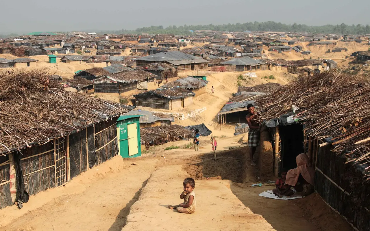 Rows of bamboo and tarpaulin shelters stretching across the hills of Kutupalong refugee camp